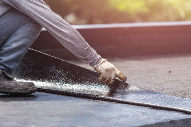 Professional Emergency Waterproofing technician working in Sand Creek, MI